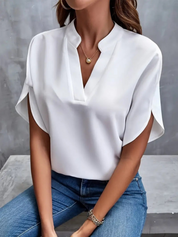 Chic V-hals Bluse til Damer med en Fortryllende Stil