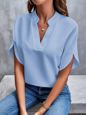 Chic V-hals Bluse til Damer med en Fortryllende Stil