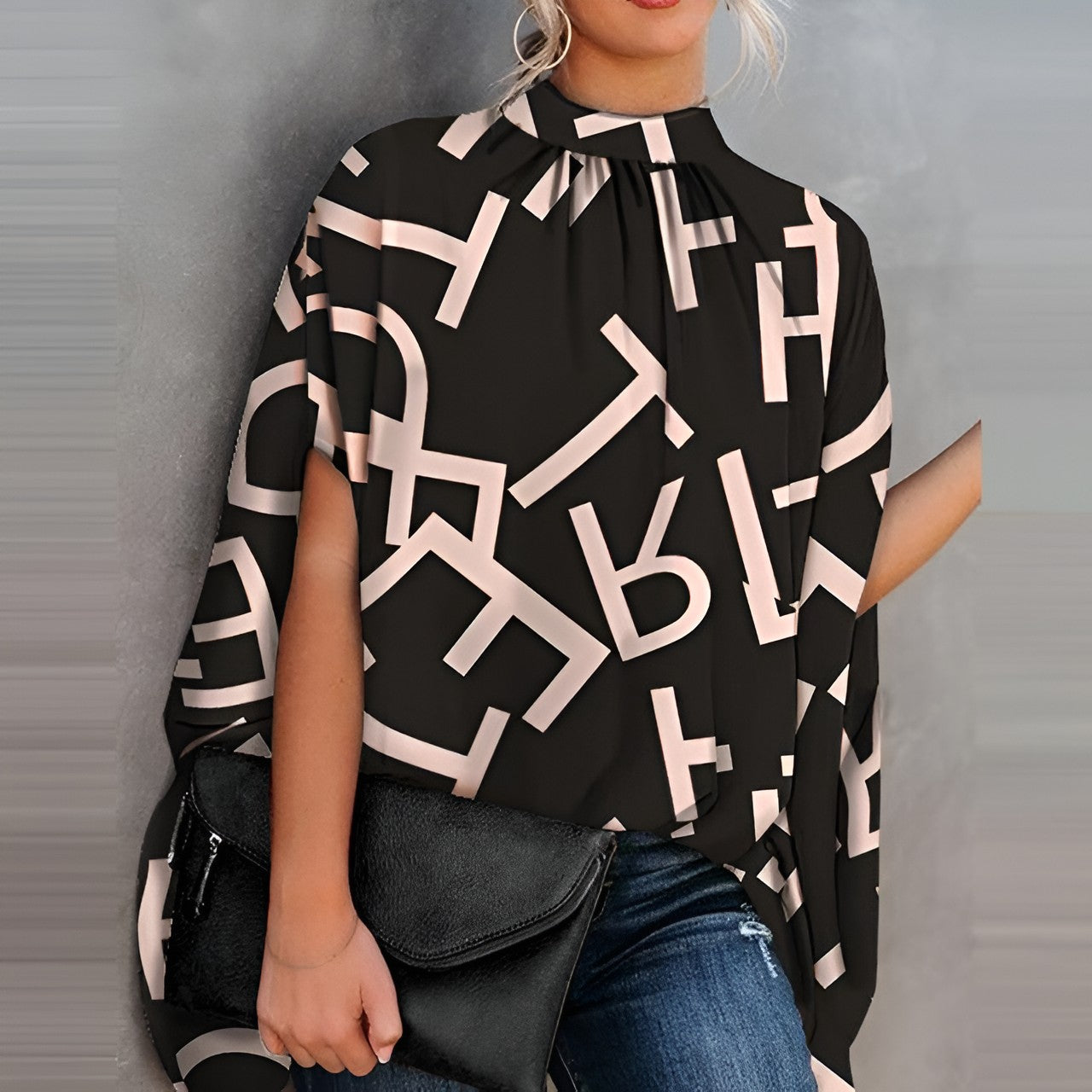 Mikha | Stilfuld Batwing Ærmer Bluse med Elegant O-hals