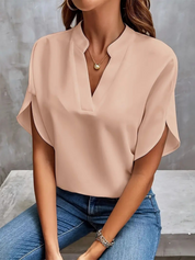 Chic V-hals Bluse til Damer med en Fortryllende Stil