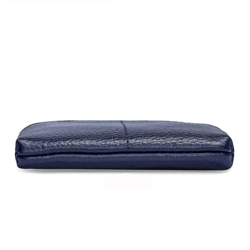 Arely | Kompakt rejsetaske i ægte læder med nøgleholder 4