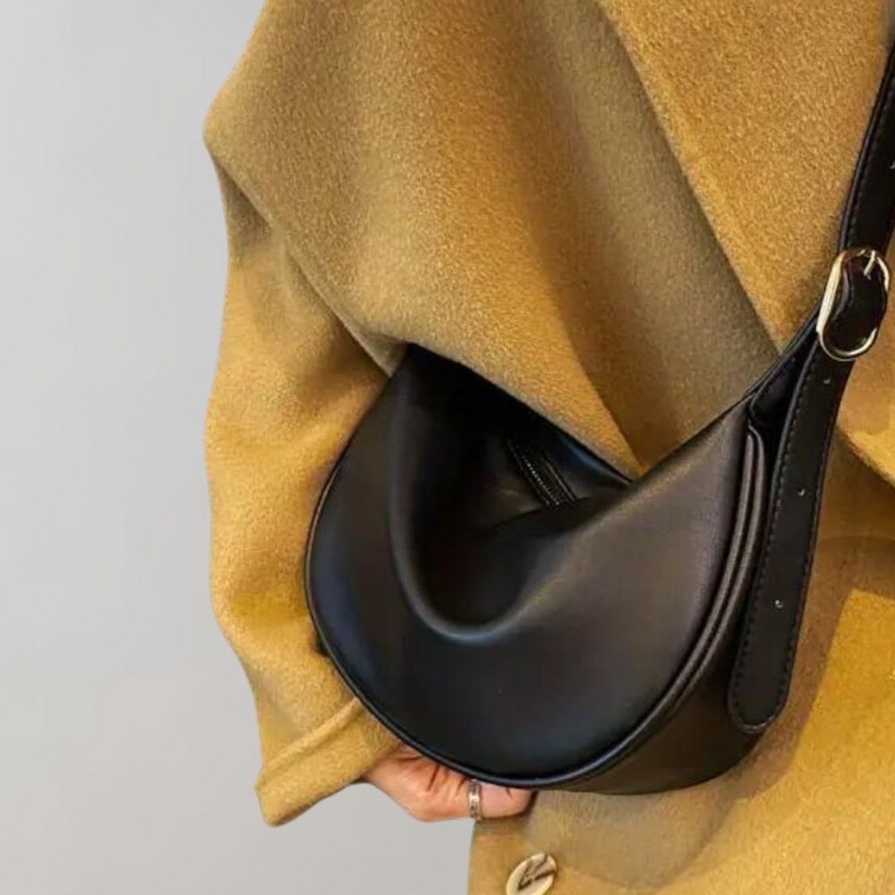 Elegant crossbody-taske til kvinder i minimalistisk vegansk læder 0