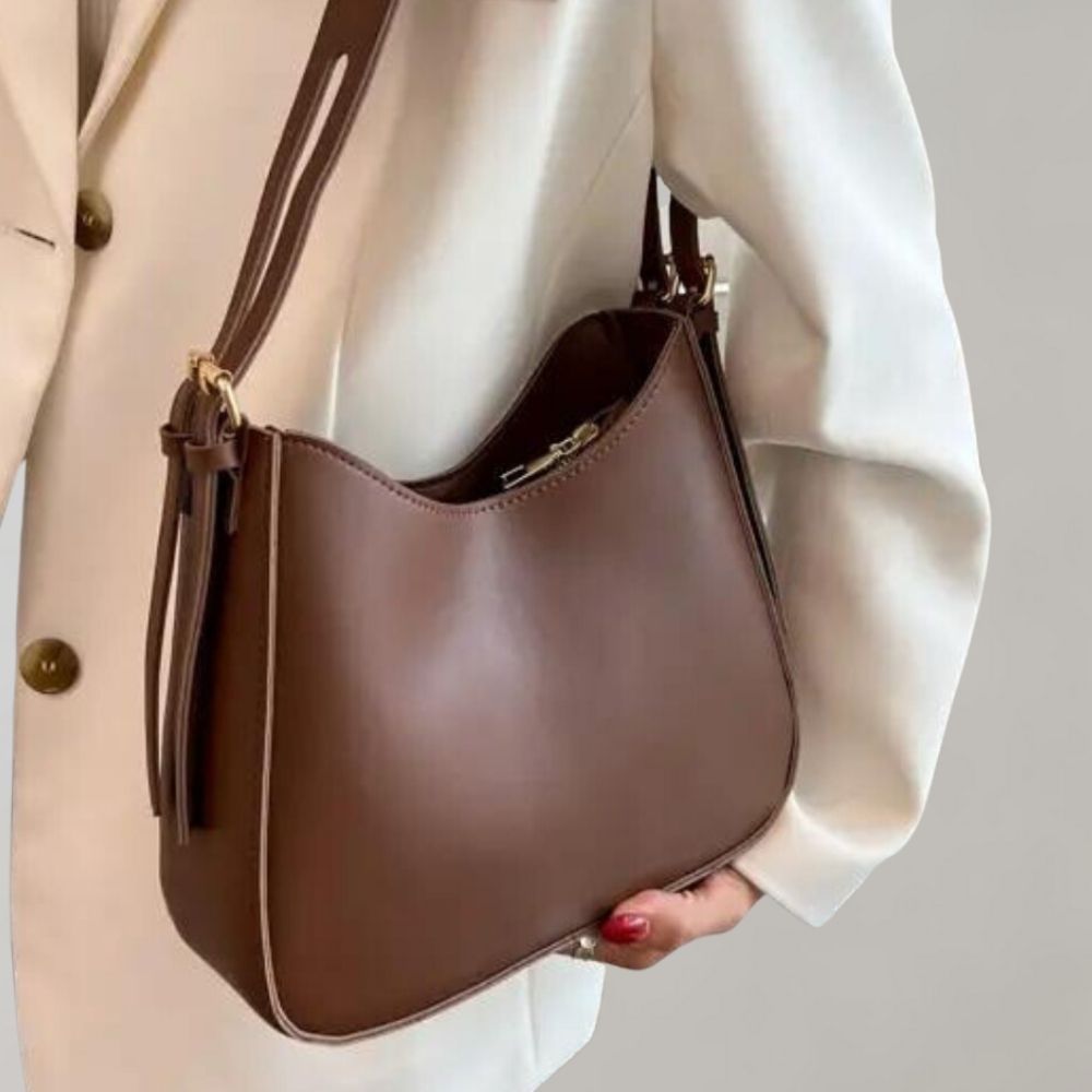 Minimalistisk crossbody-taske til kvinder i elegant vegansk læder 0