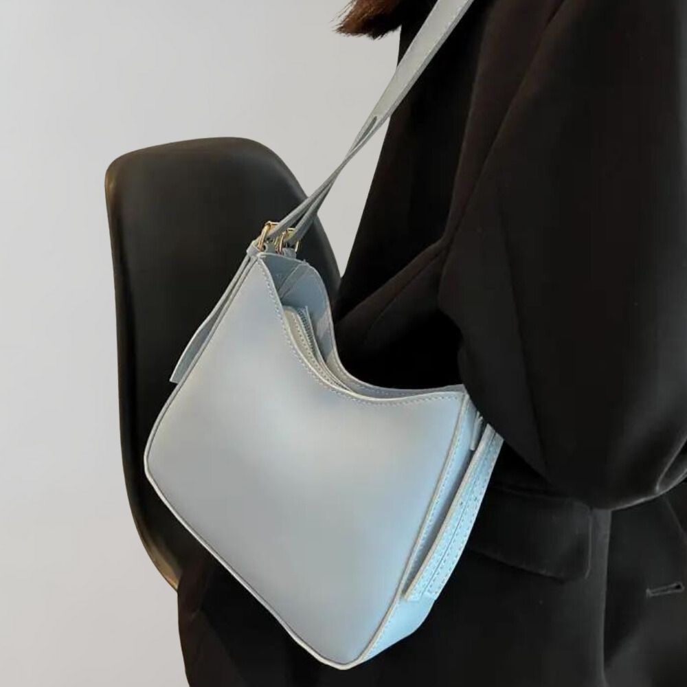 Minimalistisk crossbody-taske til kvinder i elegant vegansk læder 2