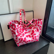 Elegant leopardprint porter tas med en chic silhuet