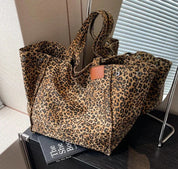 Elegant leopardprint porter tas med en chic silhuet