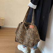 Elegant leopardprint porter tas med en chic silhuet
