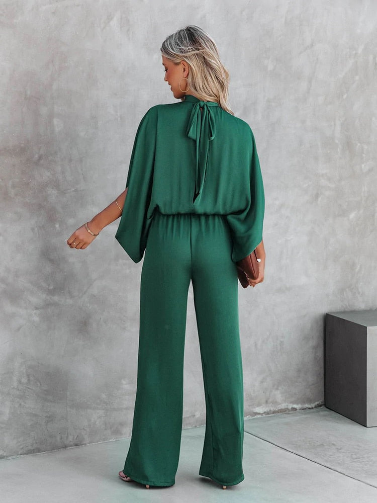 Chique grøn jumpsuit med høj krave fra Gracelyn