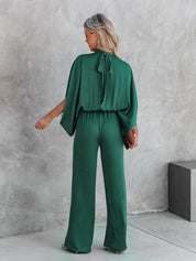 Chique grøn jumpsuit med høj krave fra Gracelyn