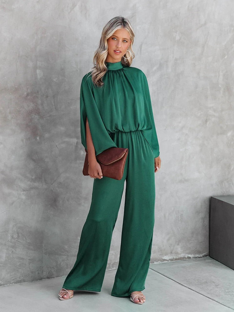 Chique grøn jumpsuit med høj krave fra Gracelyn