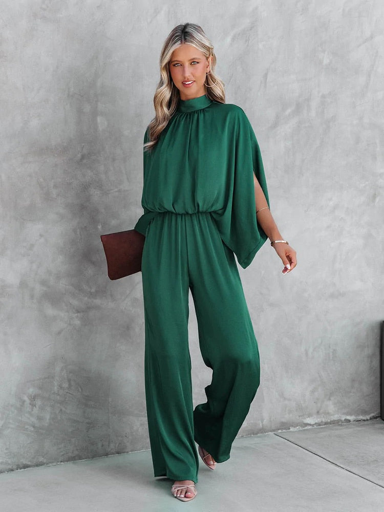 Chique grøn jumpsuit med høj krave fra Gracelyn