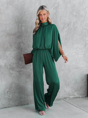 Chique grøn jumpsuit med høj krave fra Gracelyn