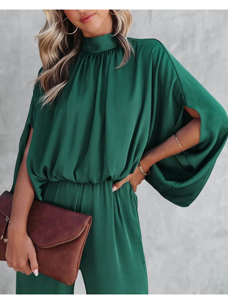 Chique grøn jumpsuit med høj krave fra Gracelyn