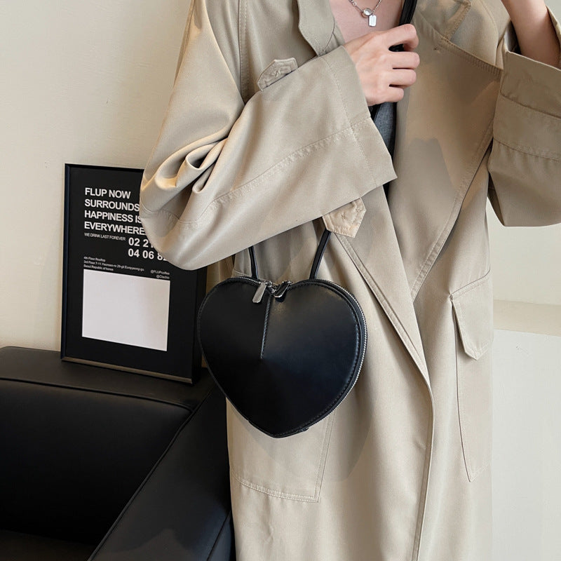 Stilfuld skuldertaske til kvinder i funktionelt materiale af høj kvalitet 1