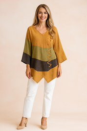 Ysabel | Asymmetrische tuniek met decoratief zijdetail 1