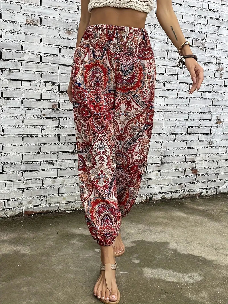 Stilfuld boho-chic bukser med behagelig smocket talje og unik etnisk print