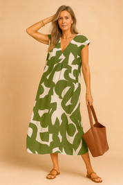Groene midi-jurk met abstracte print en V-hals