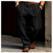 Klassieke herenlinnen broek met plooien in diepzwart, met een rechte, ontspannen pijp en een hoge tailleband — ideaal voor smart-casual of geklede outfits.