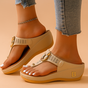 Instap slippers voor dames met sleehak en geperforeerde band