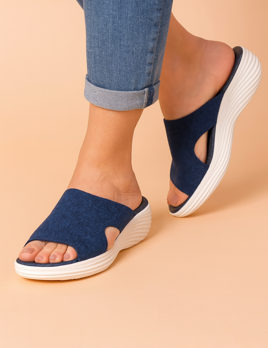 Dames instap slippers met sportieve look en golvende platformzool