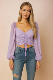 Lila cropped blouse met ruches en transparante ballonmouwen