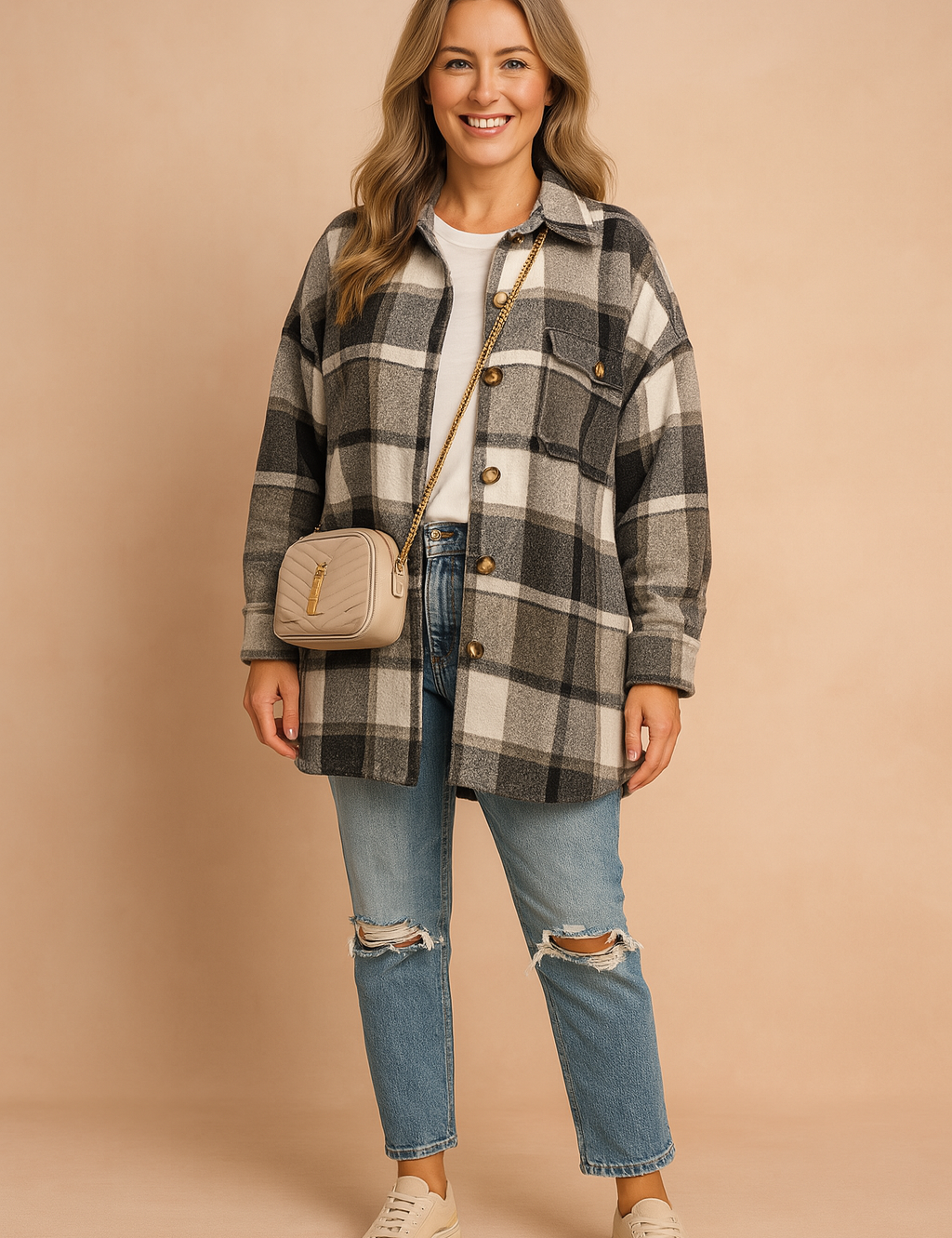Zwart-wit flanellen shirt met grote ruit en verlaagde schouders, oversized pasvorm voor casual damesstijl.