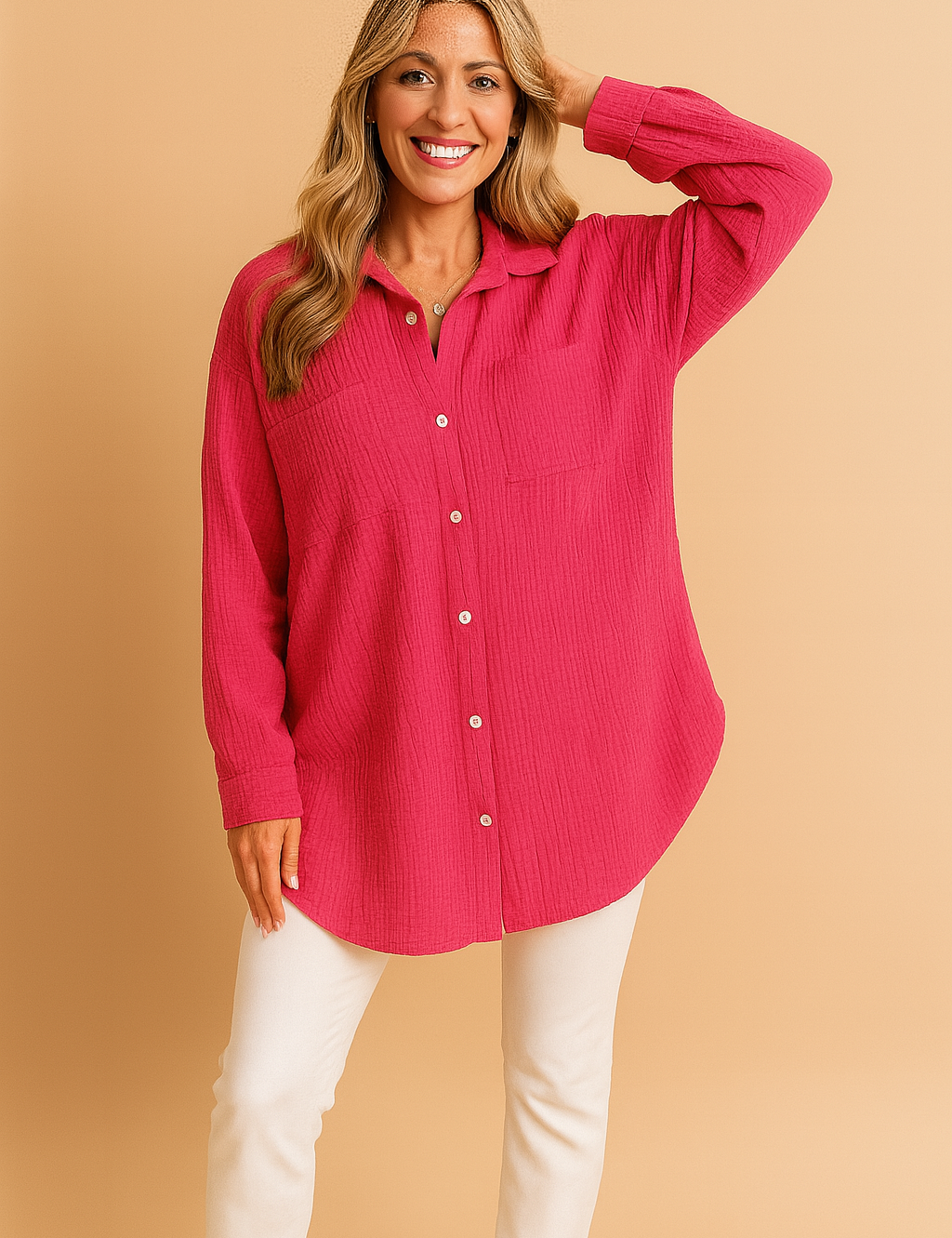 Fuchsia roze oversized blouse met lange mouwen, borstzakje en natuurlijke kreukstructuur, ideaal voor casual looks.