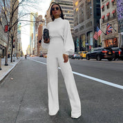 Stilfuld langærmet jumpsuit til damer