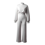 Stilfuld langærmet jumpsuit til damer