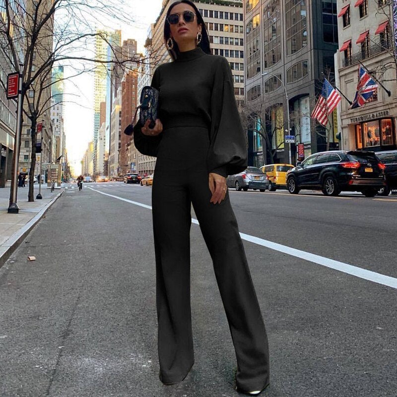 Stilfuld langærmet jumpsuit til damer